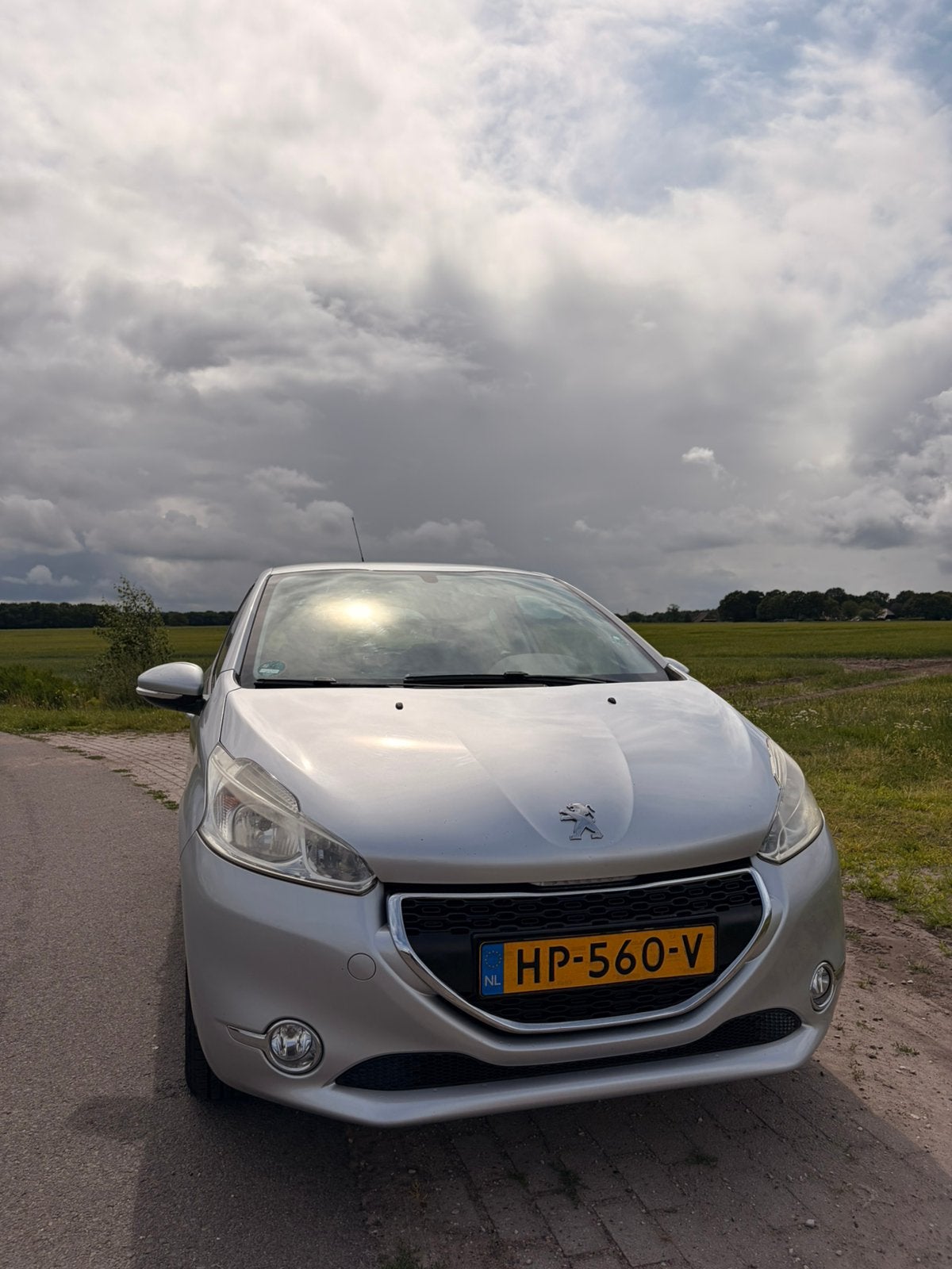 Peugeot 208 1.2 VTI 60KW/82PK 3-D 2013 Grijs, Auto's, Voorwielaandrijving, Handgeschakeld, Particulier, Hatchback