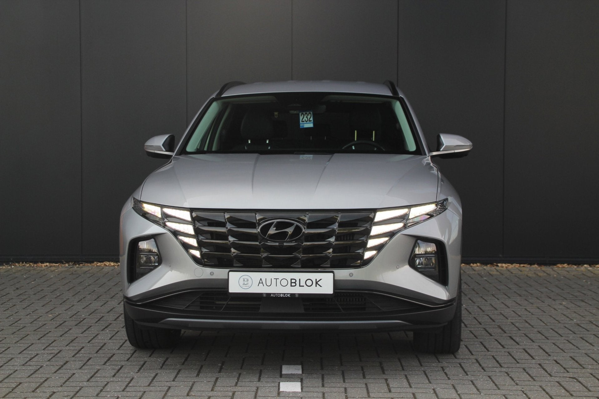 Hyundai Tucson 1.6 T-GDI PHEV Premium 4WD | Stoelverwarming, Auto's, Hyundai, Gebruikt, Zwart, 4 cilinders, Bedrijf