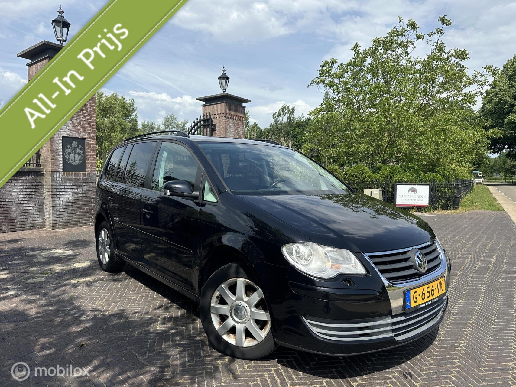 Volkswagen Touran 1.6 2009 7-personen Airco Navi Cruise✅, Auto's, Voorwielaandrijving, Euro 5, Stof, Gebruikt