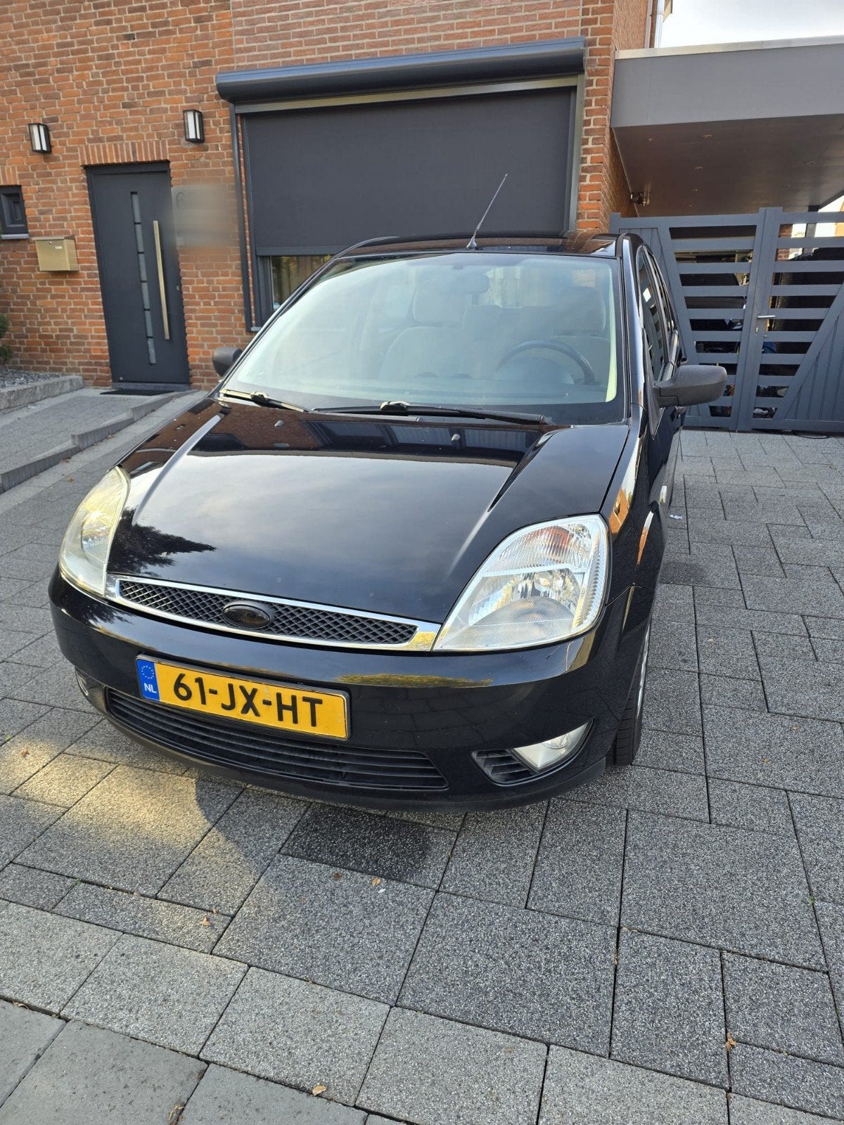 Ford Fiësta 1.4 16V 5DR 2002 Zwart, Auto's, Voorwielaandrijving, 4 cilinders, Origineel Nederlands, Handgeschakeld
