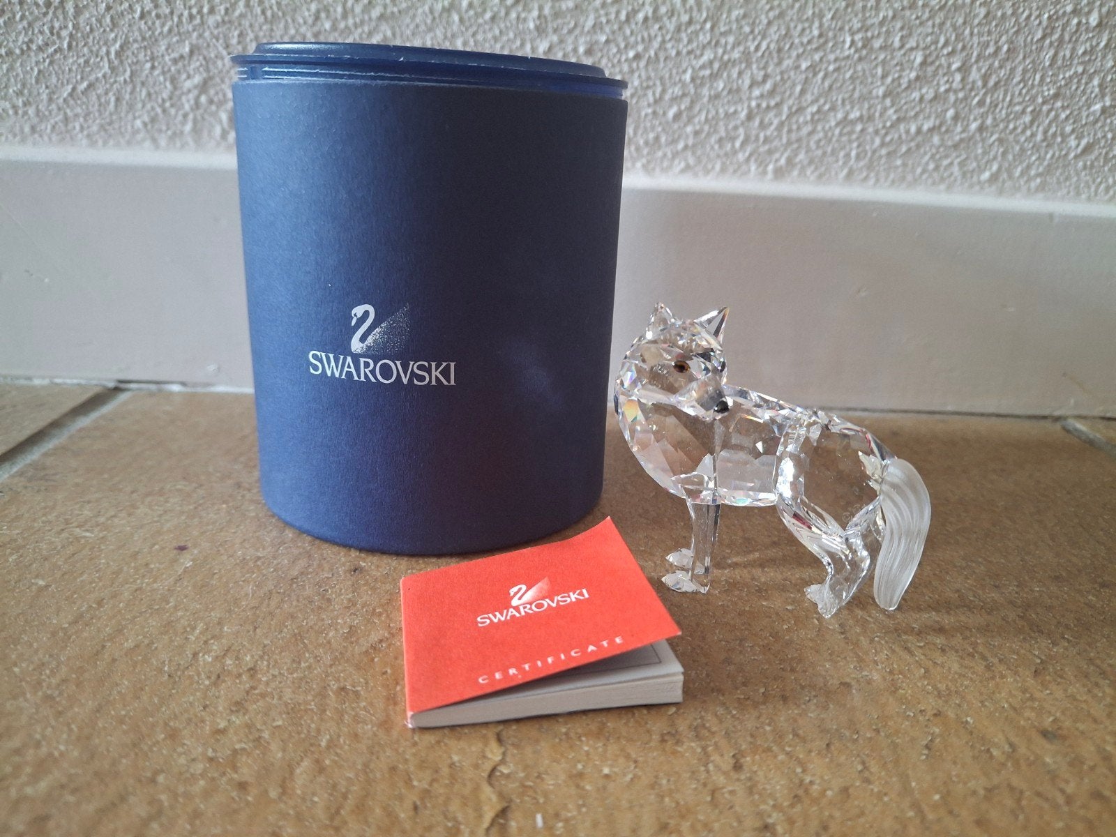 22. Swarovski wolf in doos en met certificaat, Verzamelen, Ophalen of Verzenden, Zo goed als nieuw, Figuurtje