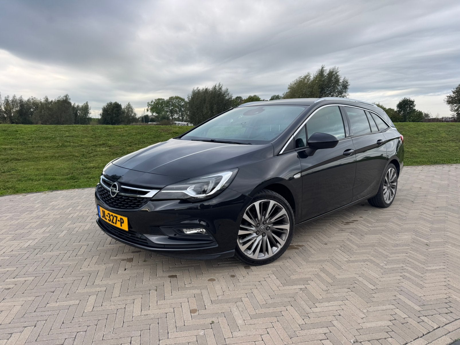 Opel Astra 1.4 Turbo 110KW Sports Tourer 2016 Zwart, Voorwielaandrijving, 4 cilinders, Zwart, Origineel Nederlands