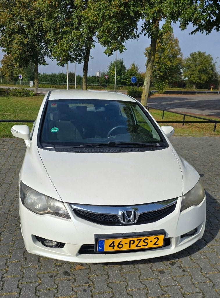 Honda Civic 1.3 95pk CVT 2011 Wit, Auto's, Euro 5, Stof, Wit, Overige kleuren