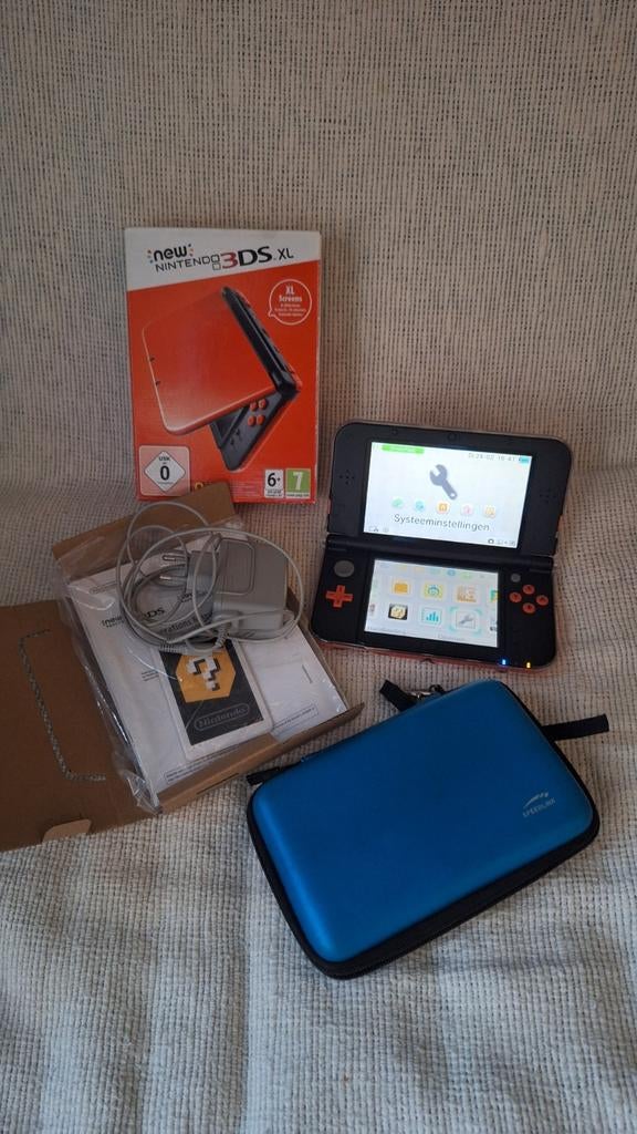 New Nintendo 3DS XL - Oranje+Zwart + Super Mario 3dLand, Gebruikt, Overige kleuren, 3DS XL, Ophalen of Verzenden