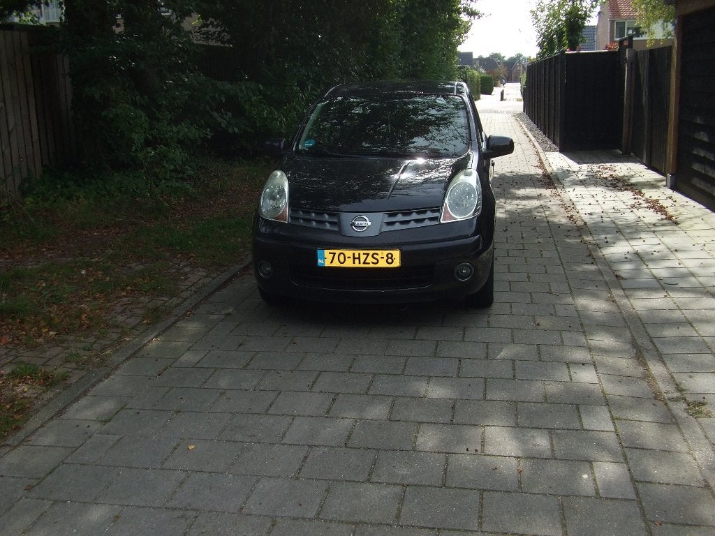 Nissan Note 1.6 16V 2009 Zwart, Auto's, Voorwielaandrijving, 40 €/maand, 4 cilinders, Metallic lak