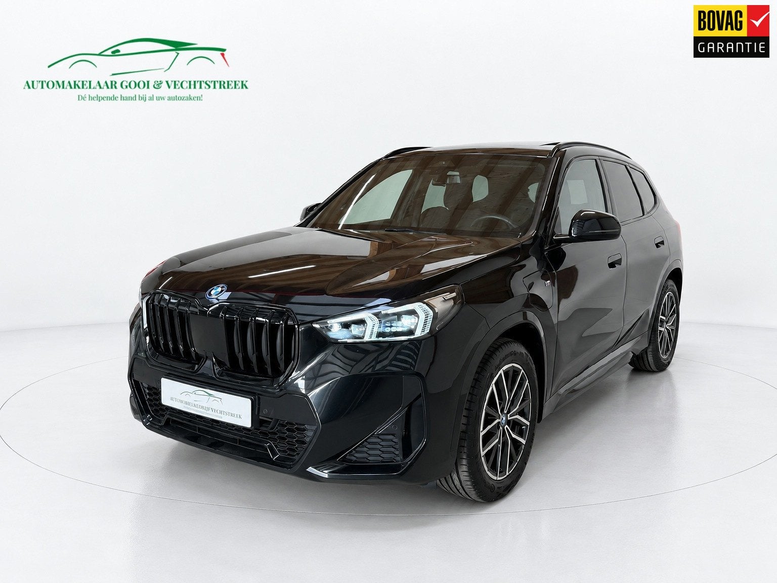 BMW X1 XDrive25e - Panorama - Trekhaak - Memory, Auto's, Gebruikt, Zwart, Leder en Stof, Zwart