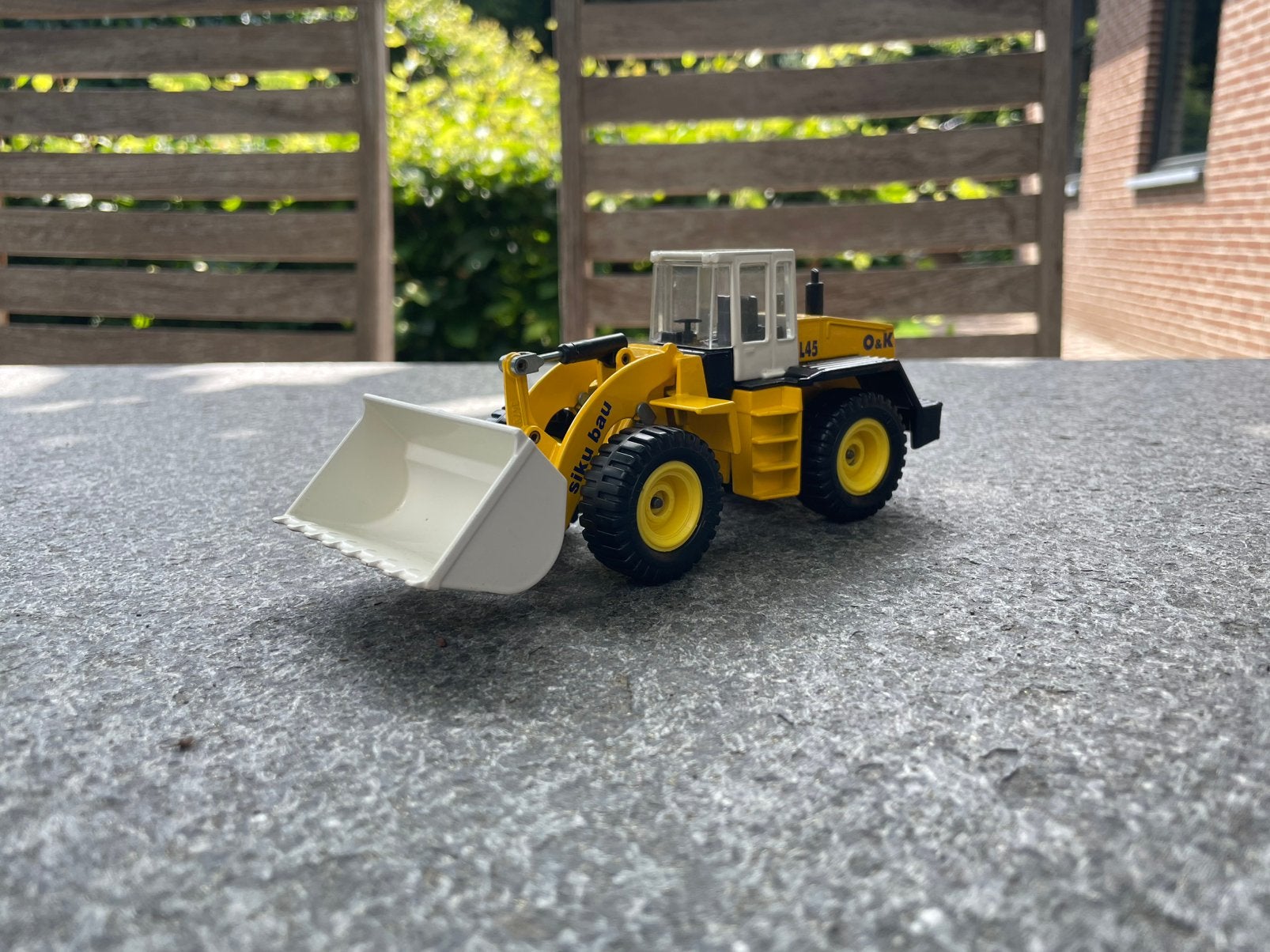 Siku 3434 - O&K L45 shovel geel, Ophalen of Verzenden, Nieuw, Bus of Vrachtwagen, SIKU