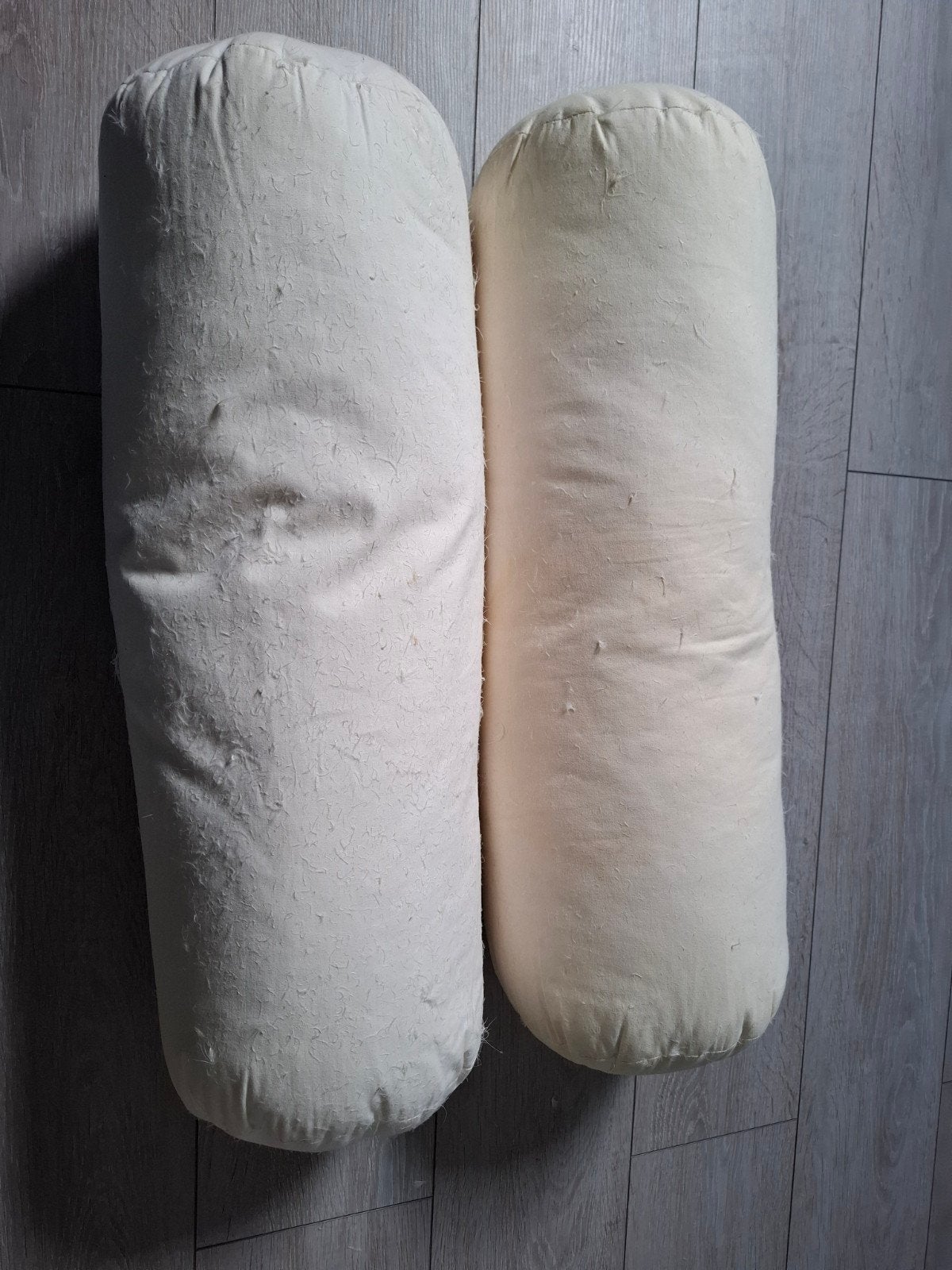 2x Rolkussen 60x22 cm met hoenderveren vulling, Overige merken, Gebruikt, Ademend, Ophalen of Verzenden