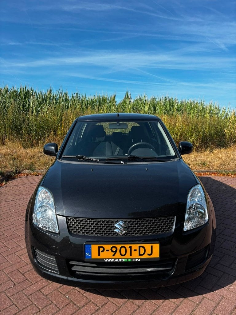 Suzuki Swift 1.3 5D 2010 Zwart, Voorwielaandrijving, Euro 5, Stof, 40 €/maand
