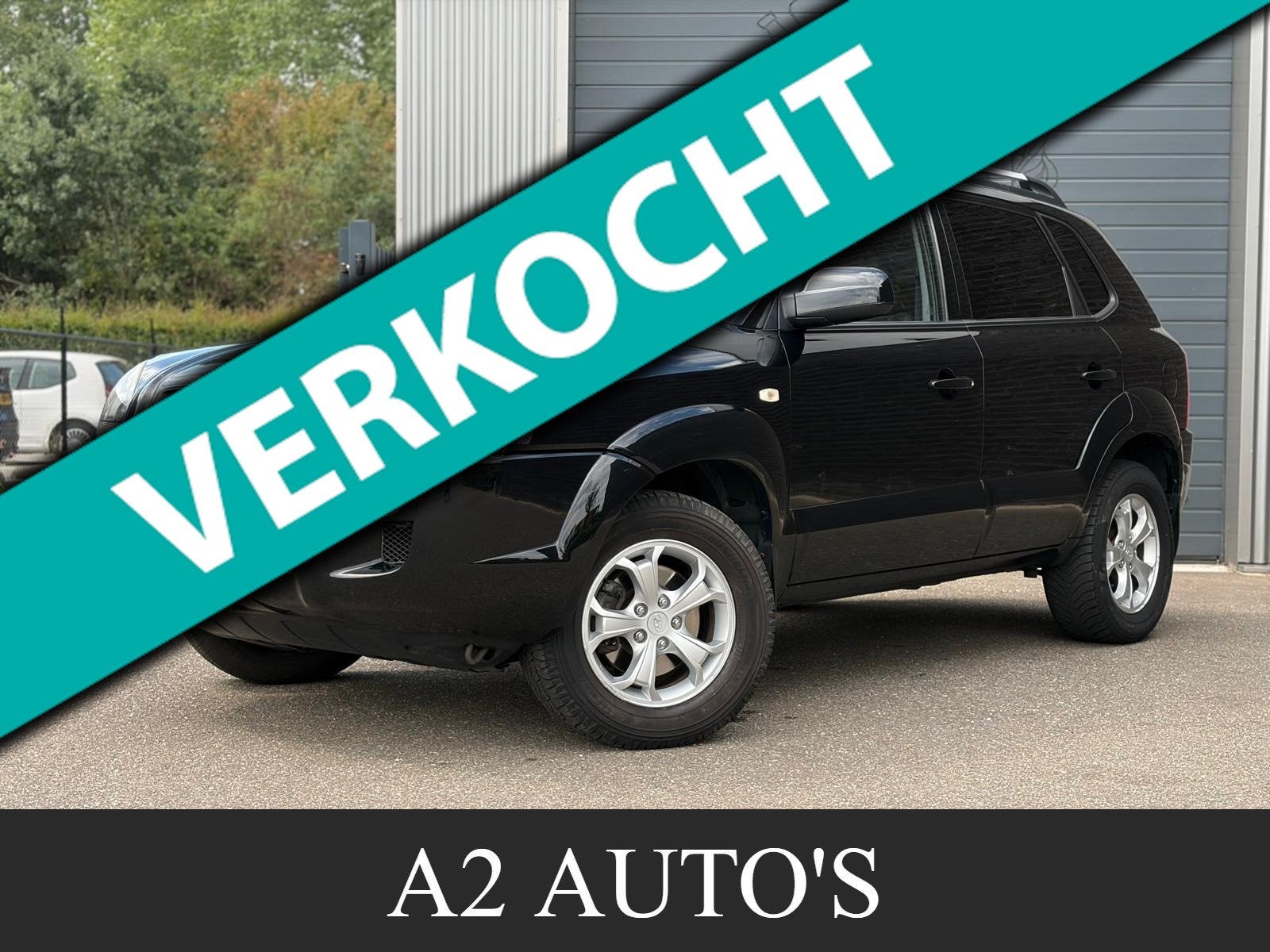 Hyundai Tucson 2.7i V6 4WD Style Automaat|Camera|Ecc, Auto's, Automaat, Gebruikt, Zwart, 2656 cc