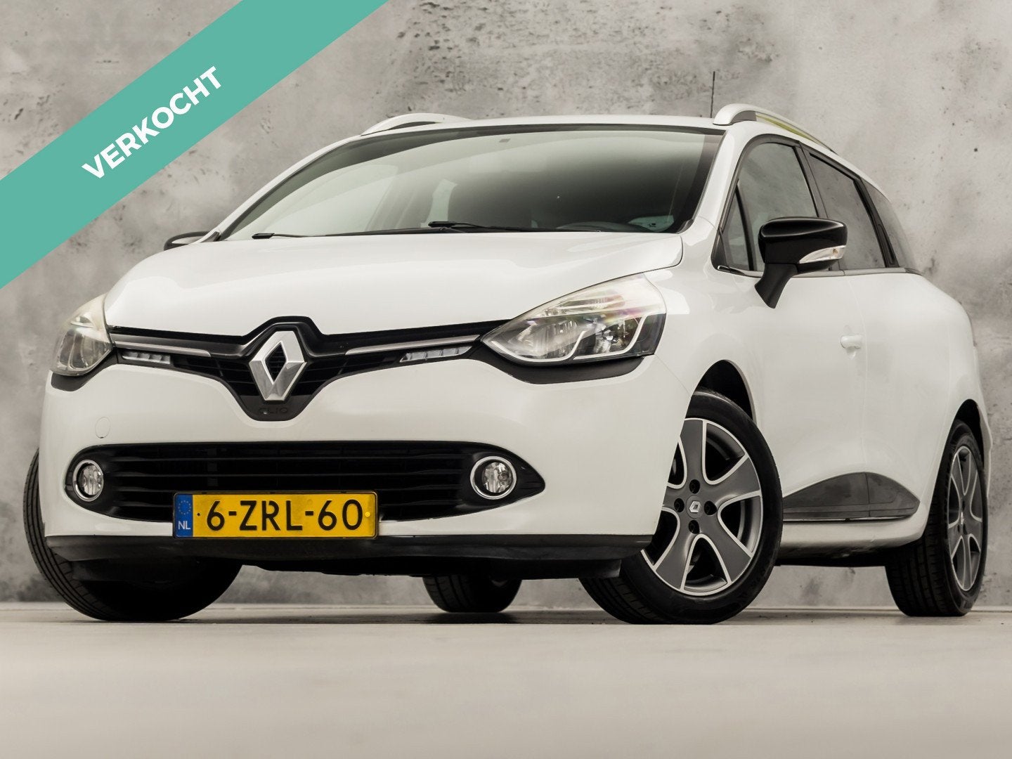 Renault Clio Estate 0.9 TCe Dynamic Sport (NAVIGATIE, CRUISE, Voorwielaandrijving, Stof, Zwart, Wit