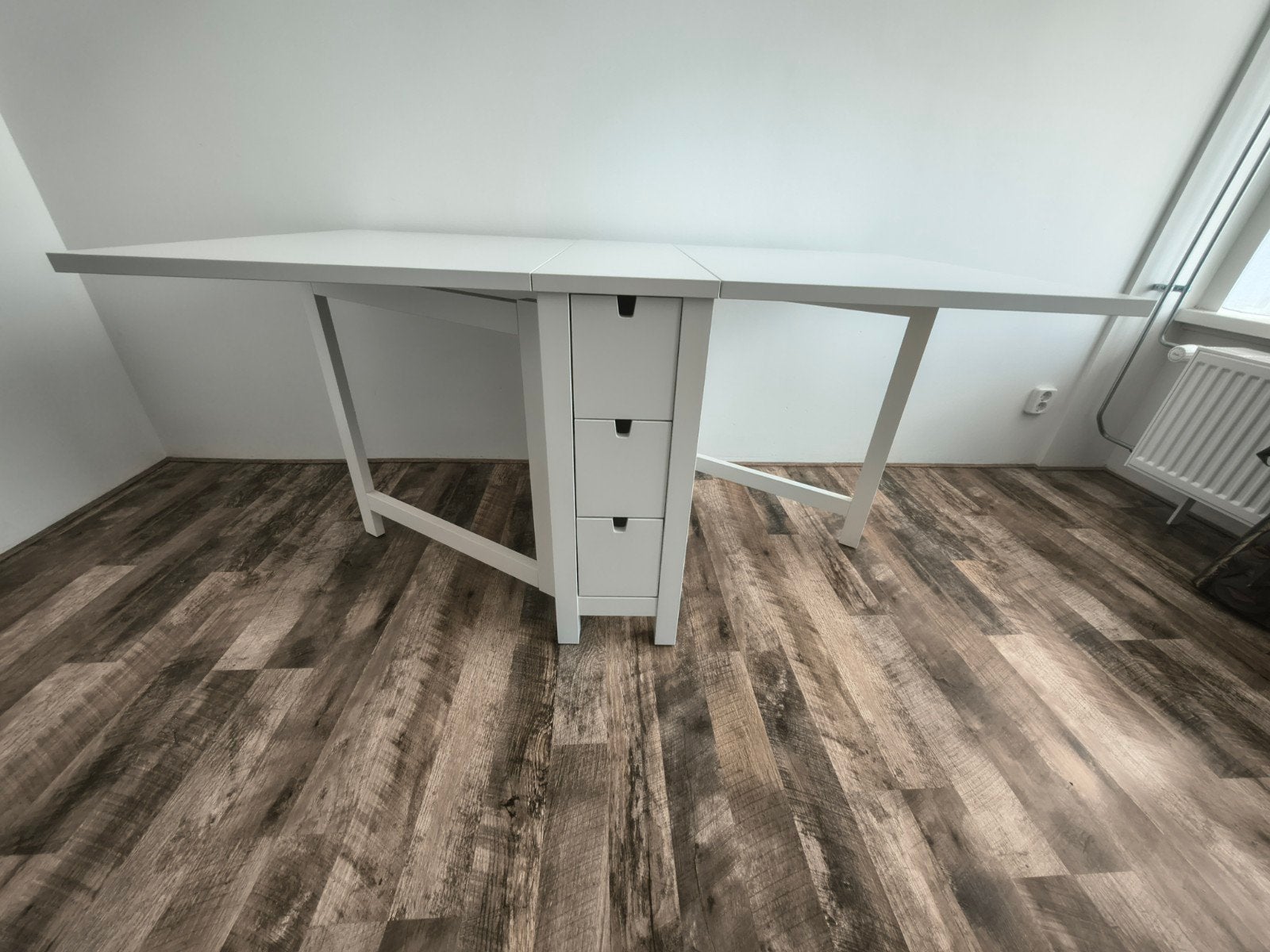 Witte klap tafel, Ophalen