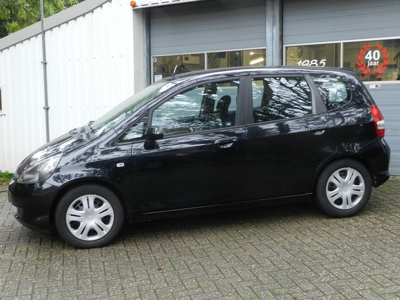 Honda Jazz 1.2 5Deurs Cool Airco Centrale vergrendeling afst, Auto's, Voorwielaandrijving, Dealer onderhouden, Zwart, 4 cilinders