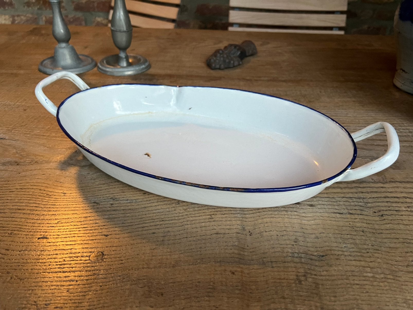 Oud geëmailleerd teiltje., Ophalen