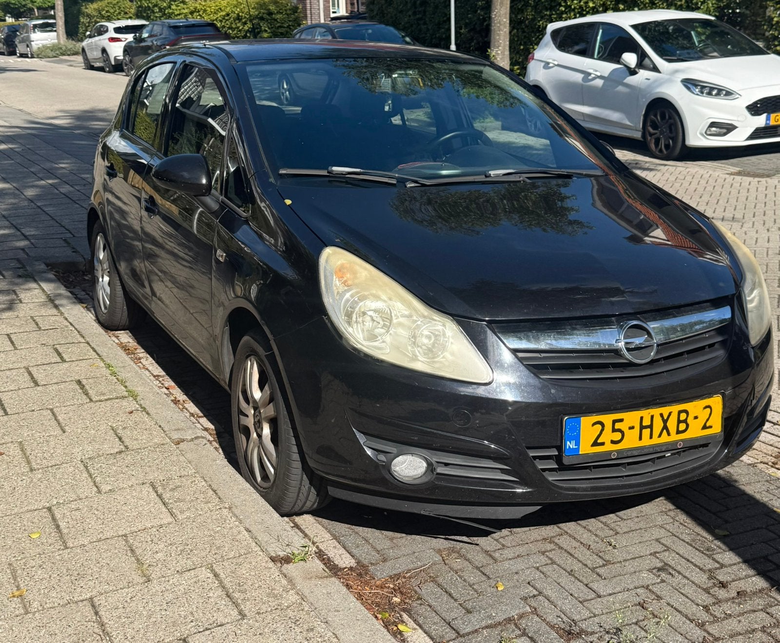 Opel Corsa 1.4 16V 5D 2009 Zwart, Auto's, Voorwielaandrijving, 1063 kg, 4 cilinders, Origineel Nederlands