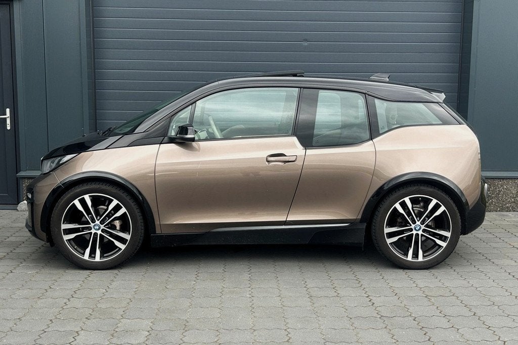 BMW i3 S Executive Edition 120Ah 42 kWh LODGE PANO H/K CARPL, Auto's, BMW, Automaat, Achterwielaandrijving, Huisgarantie, Met garantie (alle)