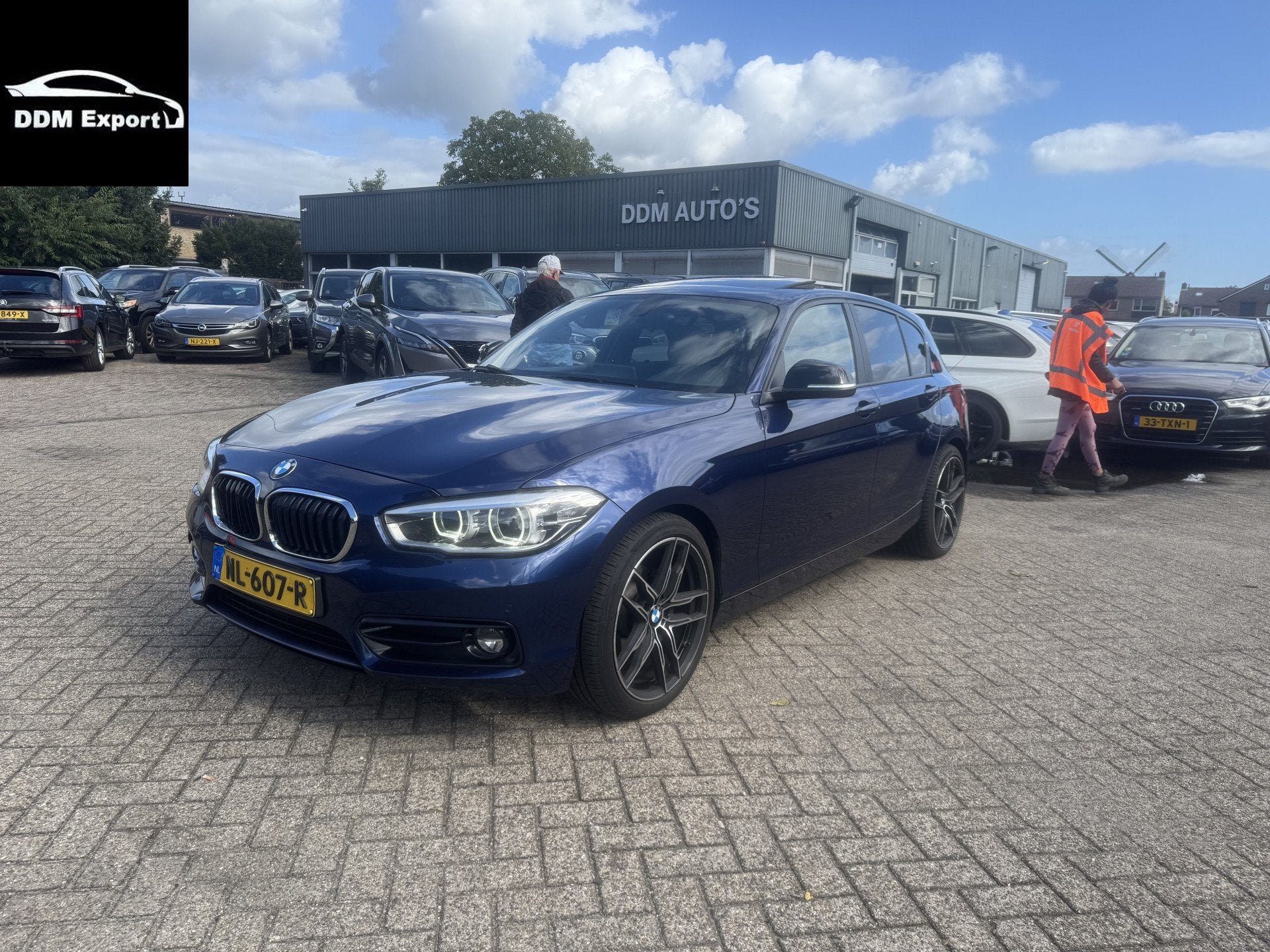 BMW 1-serie 118i Centennial High Executive Automaat XENON/LE, Auto's, Gebruikt, Blauw, 650 kg, 3 cilinders
