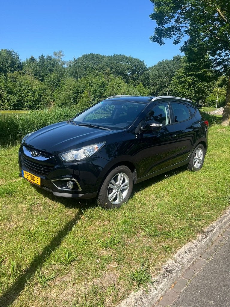 Hyundai iX35 2.0i Cvvt 163pk 2012 Zwart met Trekhaak, 1998 cc, 4 cilinders, 75 €/maand, Handgeschakeld