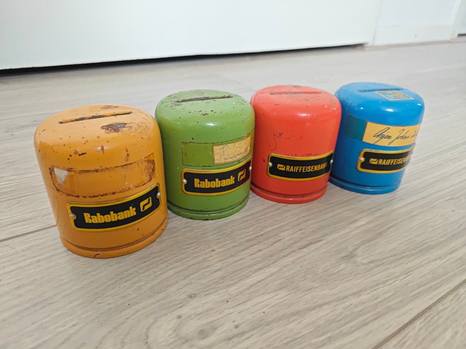 Vintage spaarpotten Rabobank/Raiffeisenbank (4 stuks), Ophalen of Verzenden, Gebruikt, Metaal of Blik, Overige thema's