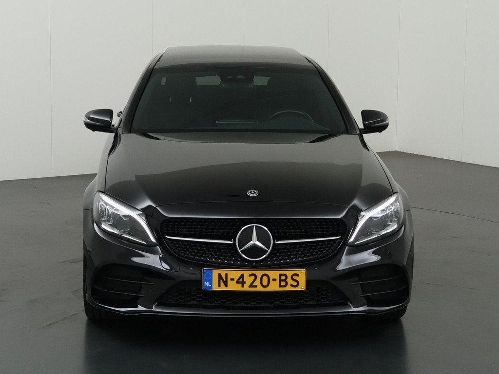 Mercedes-Benz C-klasse 300 e Business Solution AMG Limited |, Auto's, Mercedes-Benz, Automaat, 320 pk, Leder en Stof, Zwart