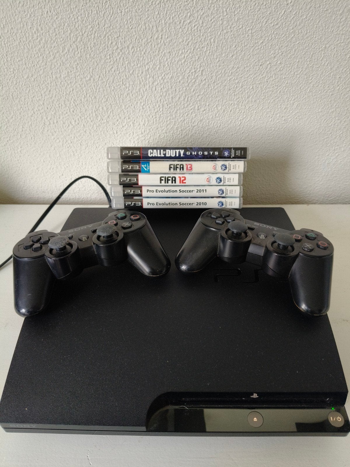 PlayStation 3 Slim (CECH-2004B) met 2 controllers en games, Gebruikt, Met 2 controllers, Ophalen of Verzenden, 120 GB