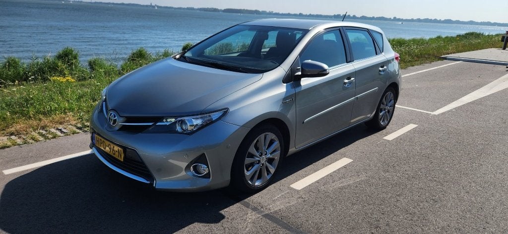 Toyota Auris 1.8 Hybrid 73KW 5D 2014 Grijs, Auto's, Toyota, Euro 5, Stof, 4 cilinders, 100 pk
