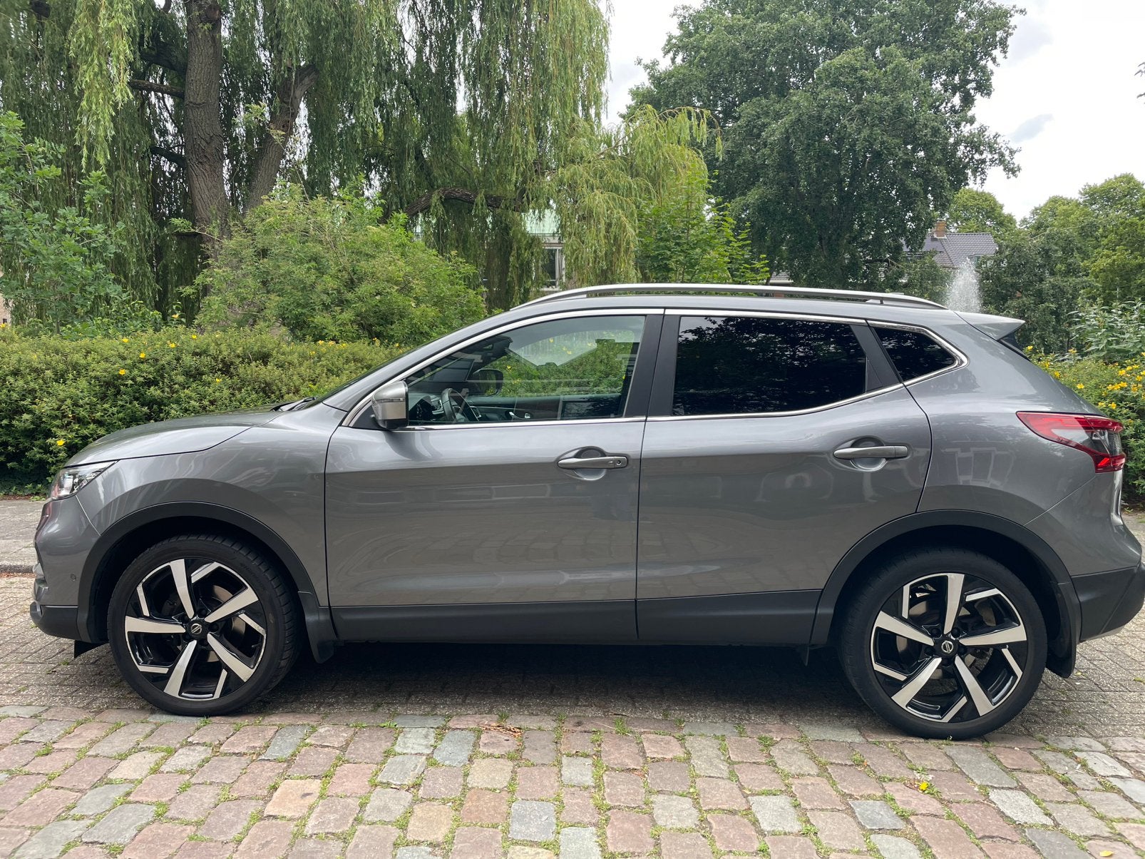 Nissan Qashqai 1.2 Dig-t 85KW 2WD CVT 2018 Grijs, Zwart, 4 cilinders, Leder, 115 pk