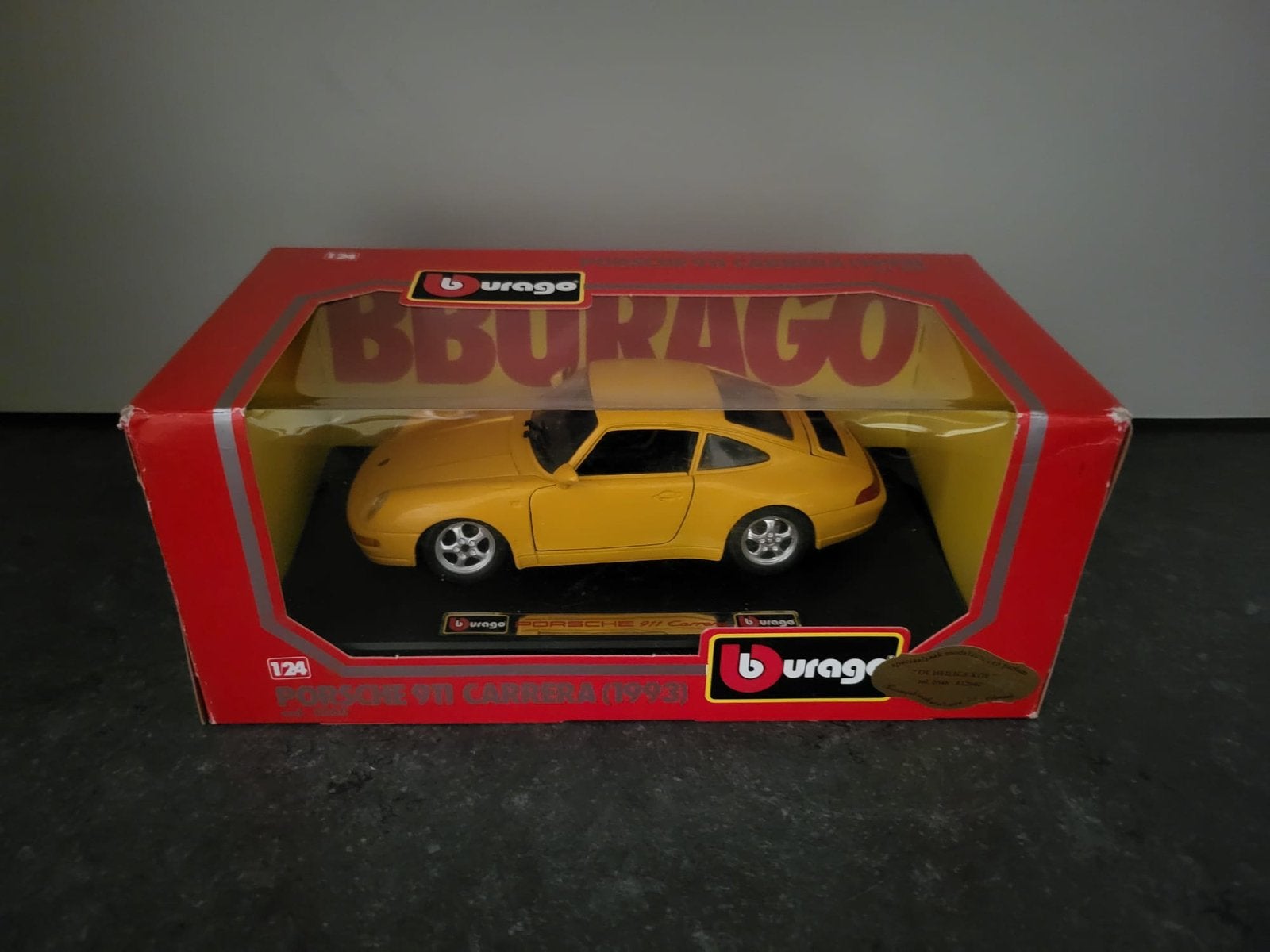 Burago Porsche 911 Carrera (1993) 1:24 modelauto, Ophalen of Verzenden, Zo goed als nieuw, Auto, Bburago