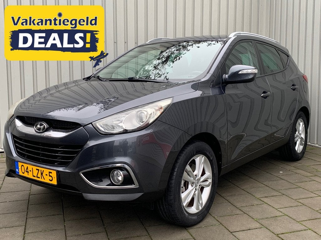 Hyundai Ix35 2.0i Business Edition|Navigatie|149000KM|Climat, Auto's, Hyundai, Zwart, 4 cilinders, Leder en Stof, 163 pk