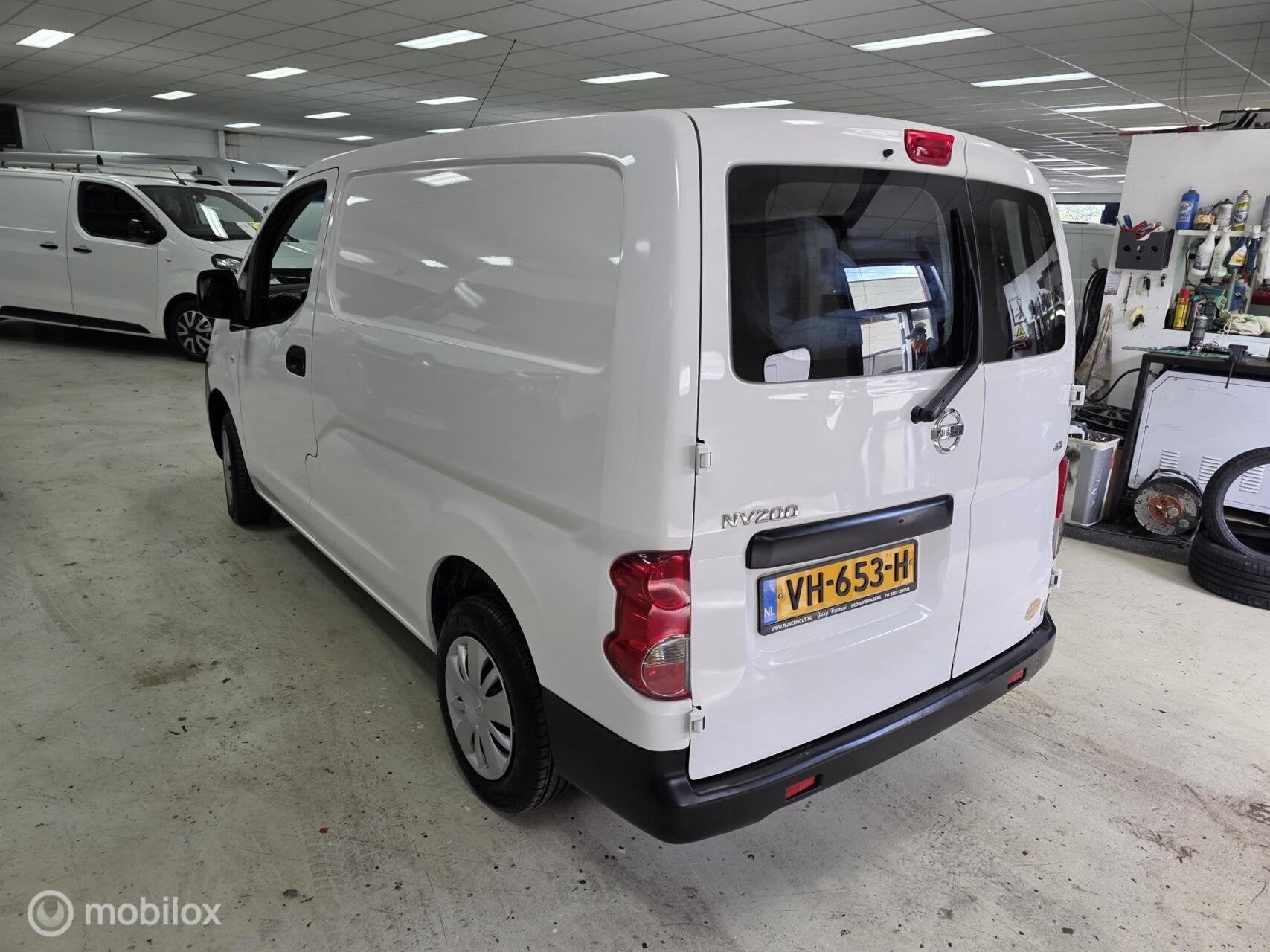 Nissan NV200 1.5 dCi Airco Cruise Camera Navi, Auto's, Euro 5, Gebruikt, 4 cilinders, Wit