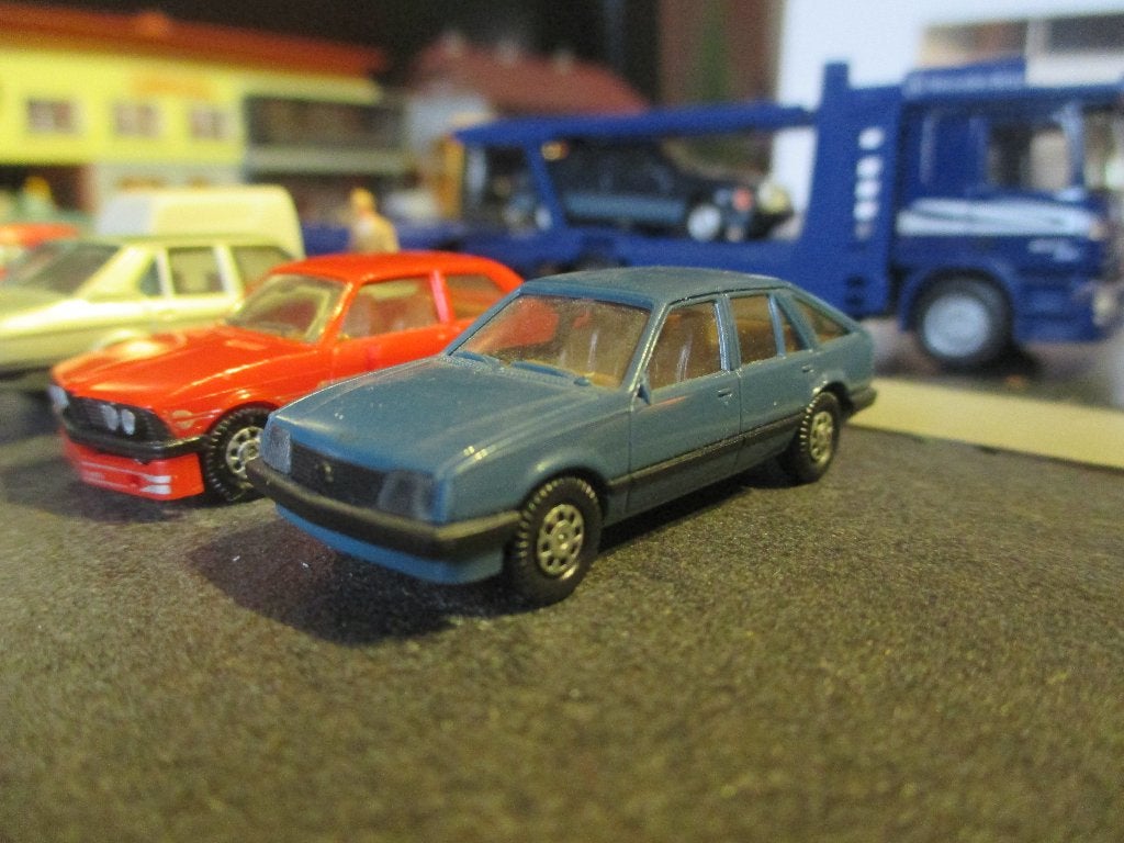 Opel Ascona C CC Hatchback - Herpa blauwgrijs, Hobby en Vrije tijd, Ophalen of Verzenden, Gebruikt, Auto, Rietze