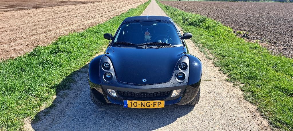 Smart Roadster 0.7 45KW 2003 Zwart, Auto's, Smart, Particulier, Roadster, Airbags, Elektrische ramen, Open dak, Radio, Benzine
