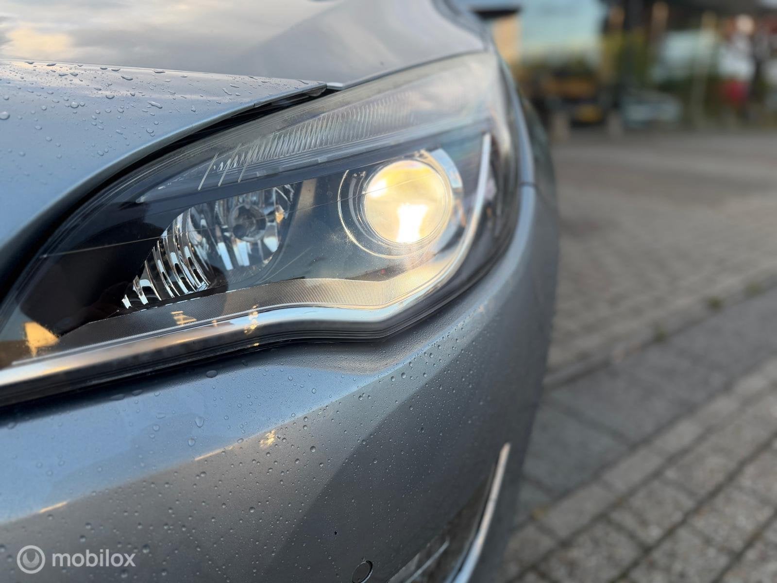 Opel Astra Sports Tourer 1.4 Turbo Edition, Euro 5, 15 km/l, Gebruikt, 4 cilinders