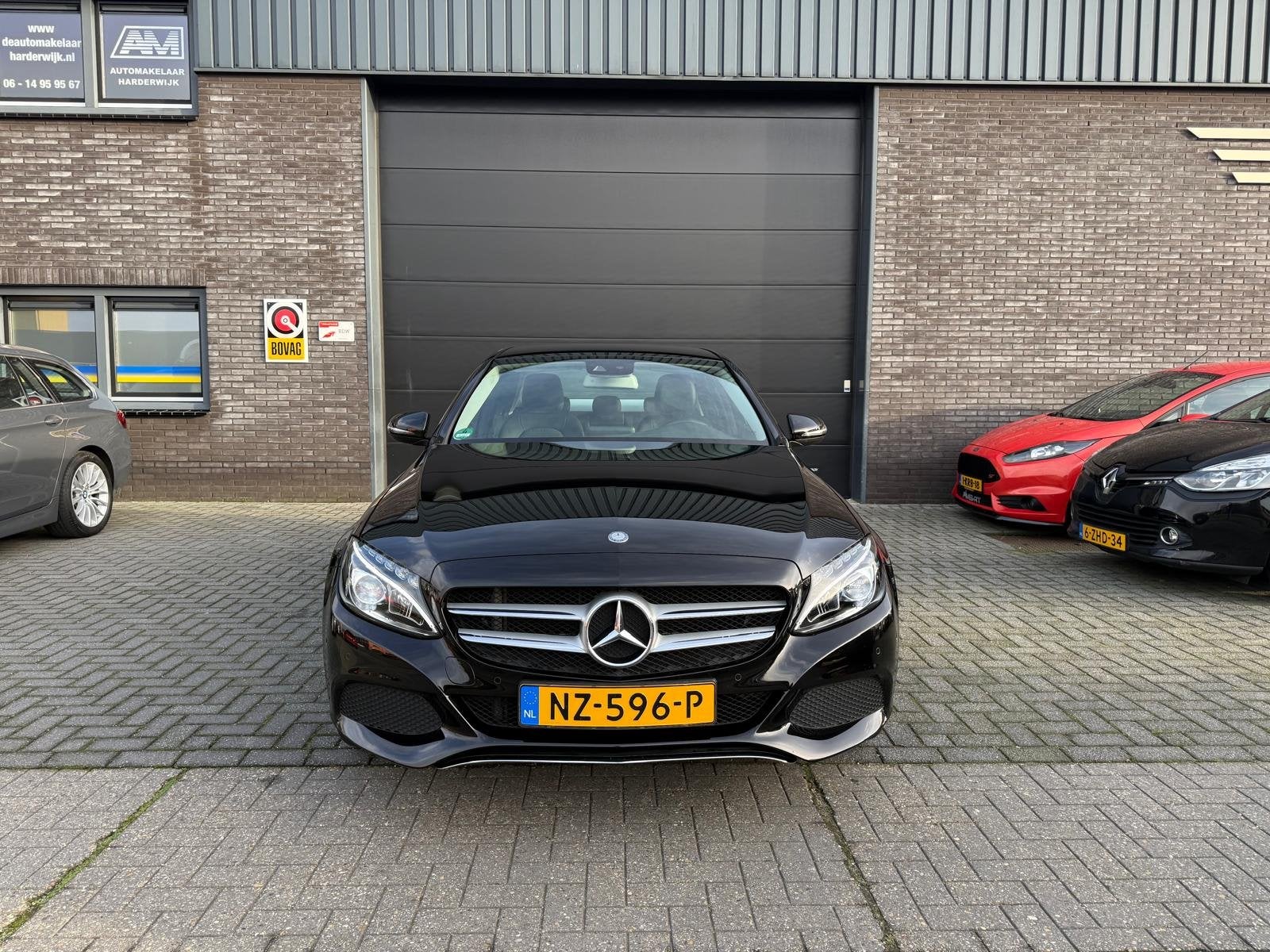 Mercedes-Benz C-Klasse 180 Prestige | 2E EIGENAAR | 3/6/12MN, Achterwielaandrijving, Gebruikt, Leder en Stof, Zwart