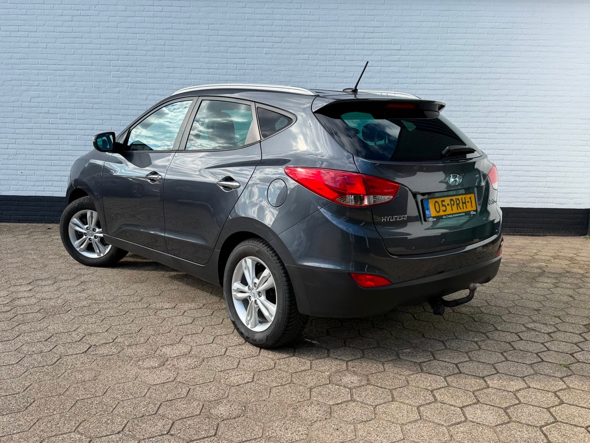 Hyundai Ix35 2.0i Style l CRUISE l CAMERA l TREKHAAK l NAP!, Auto's, Gebruikt, Zwart, 4 cilinders, Leder en Stof