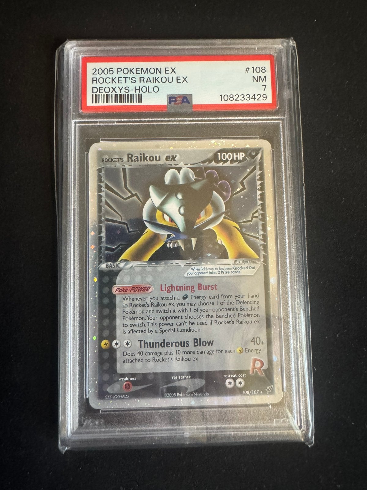 PSA 7 Rocket's Raikou ex Deoxys-Holo 2005 Pokémon Kaart, Ophalen of Verzenden, Zo goed als nieuw, Losse kaart, Foil