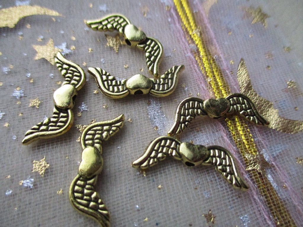 577/ gold plated tibetiaanse vleugel kralen, Hobby en Vrije tijd, Kralen en Sieraden maken, Ophalen of Verzenden, Nieuw, Hanger