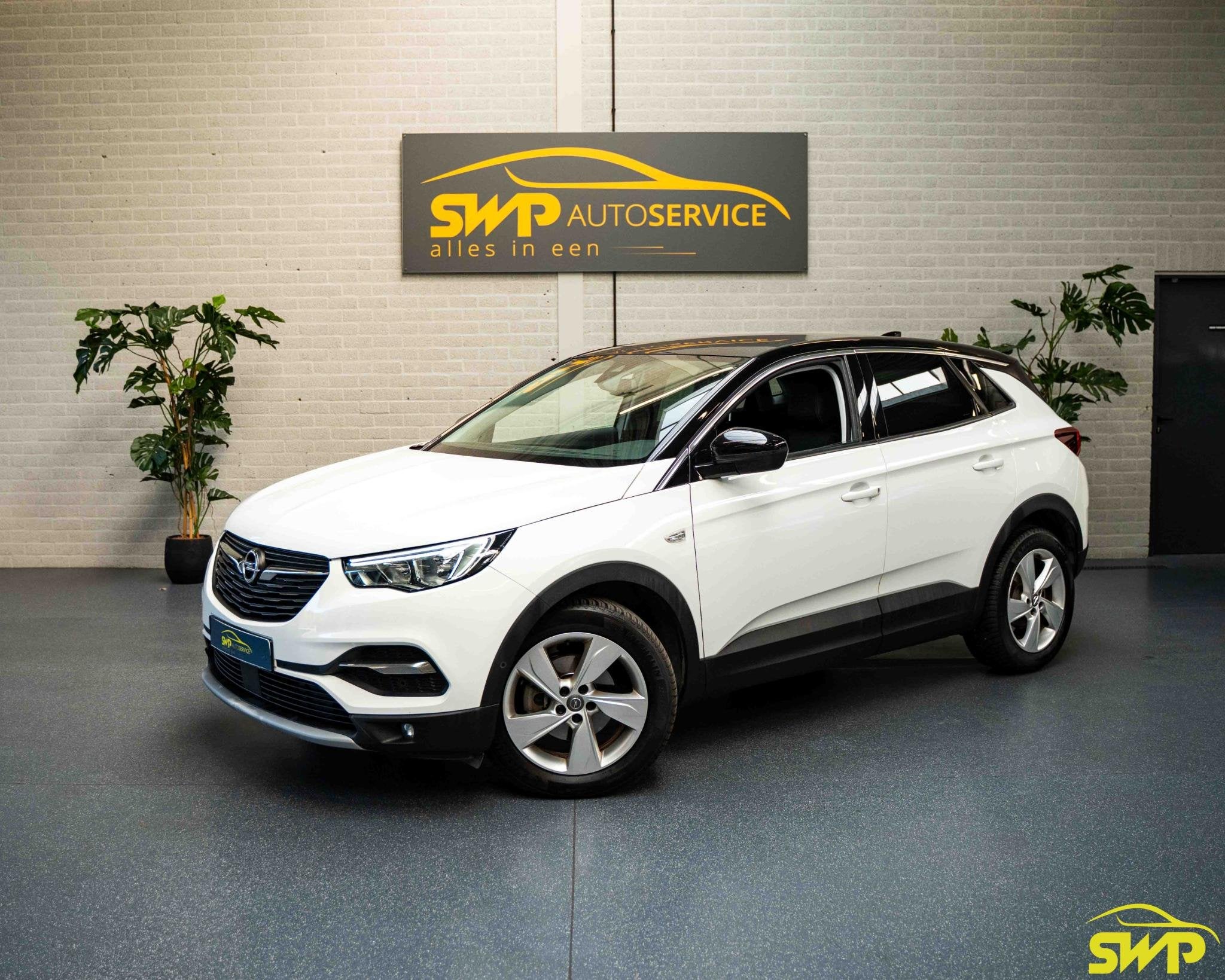 Opel Grandland X 1.2 Turbo Innovation | Navi | Camera, Auto's, Stof, Gebruikt, 1199 cc, Wit