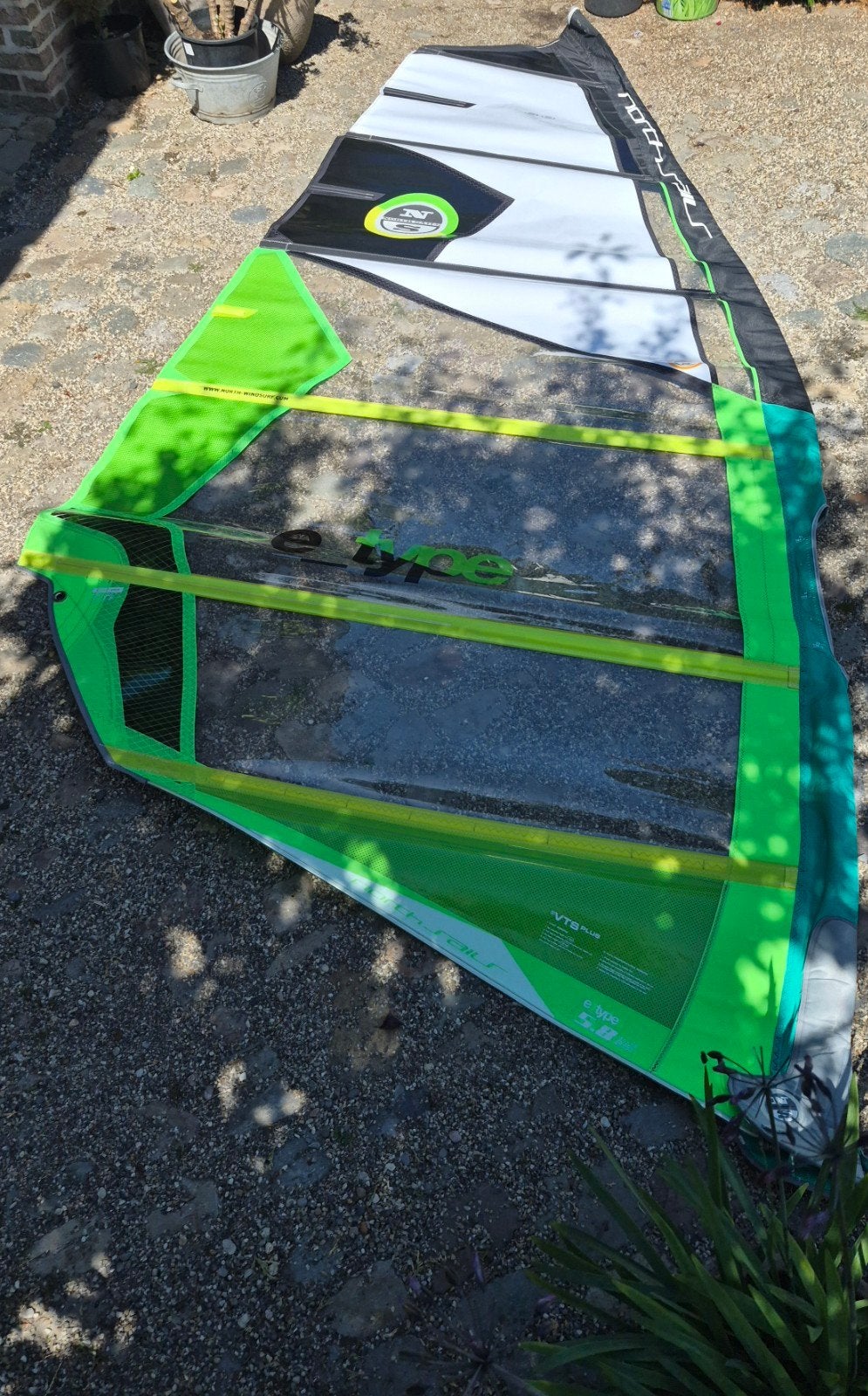 Windsurfset: North Sails zeil, mast 75% CB, verlenger, giek, Ophalen