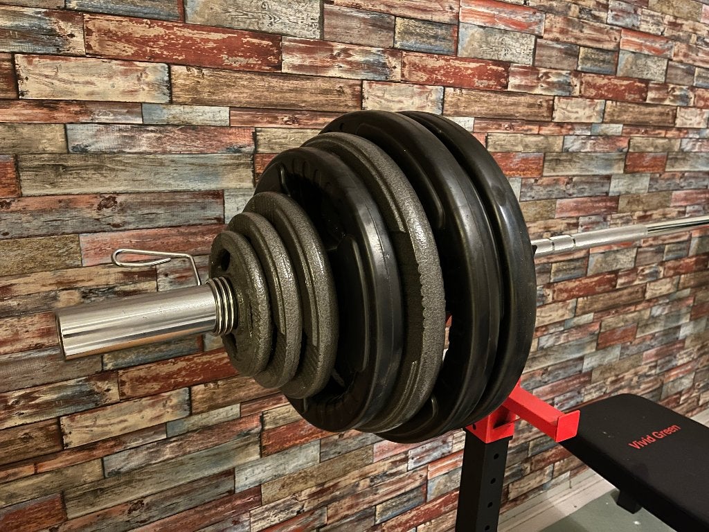 Foto 7 van Complete bankdruk set met stang en 147.5 kg aan gewichten