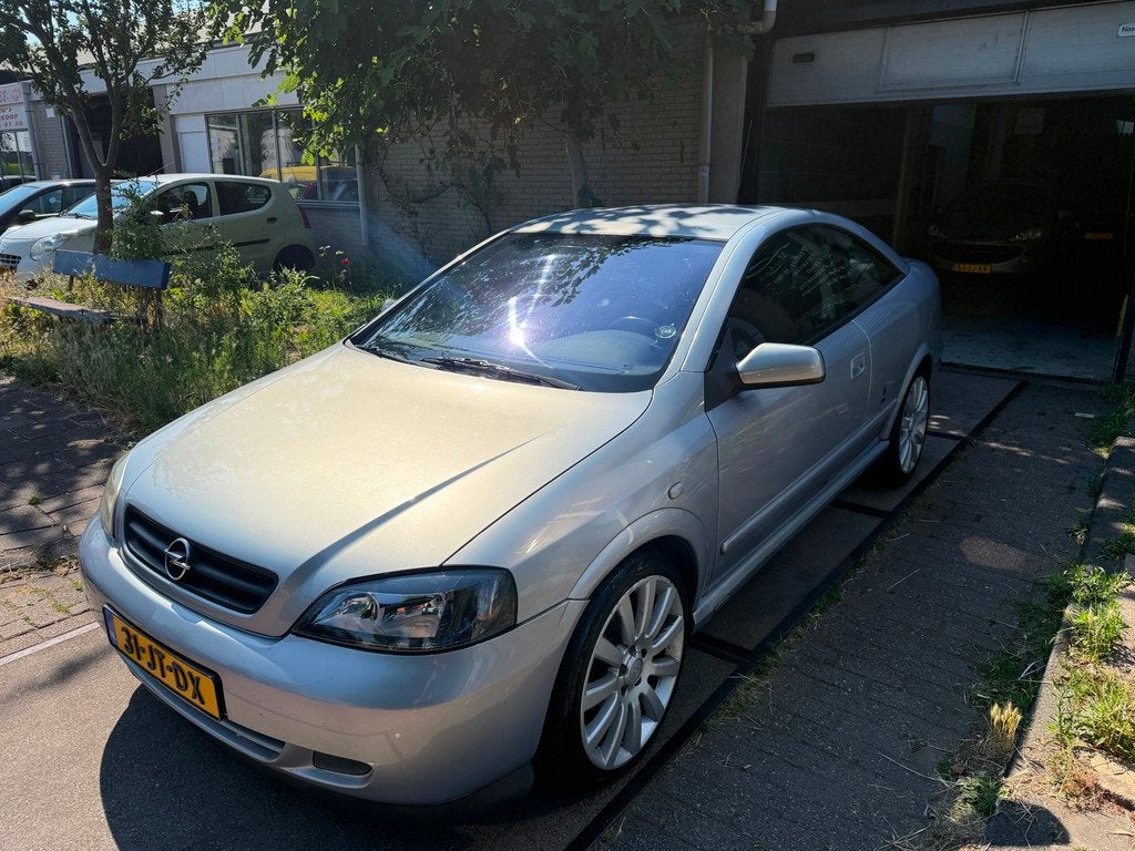 Opel Astra Coupé 1.8-16V Apk/Airco/Nap/Elek.ramen/Bluetooth, Auto's, Gebruikt, 4 cilinders, 4 stoelen, 1796 cc