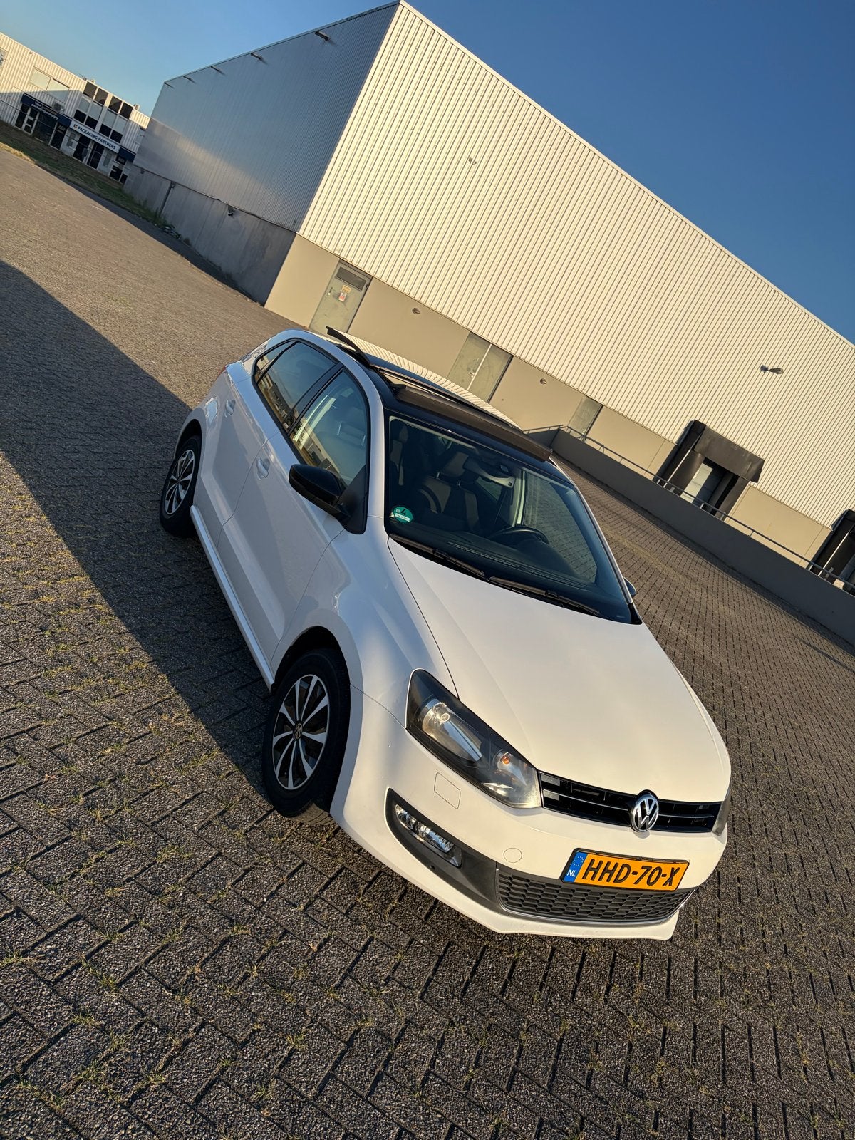 Volkswagen Polo 1.4 Style Pano 16V FSI 63KW 2011 Wit, Auto's, Voorwielaandrijving, 970 kg, 4 cilinders, Multifunctioneel stuurwiel
