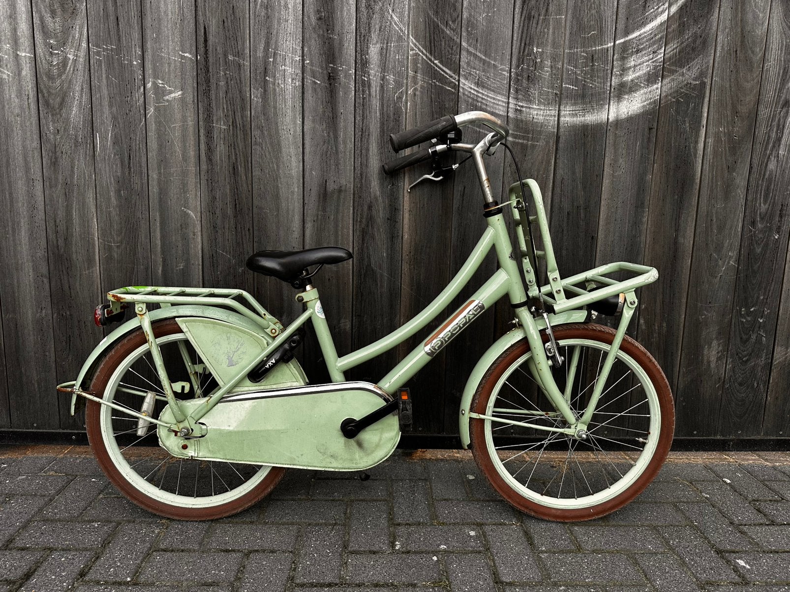 20 inch meisjesfiets met rekje, Terugtraprem, Gebruikt, Ophalen of Verzenden, Handrem