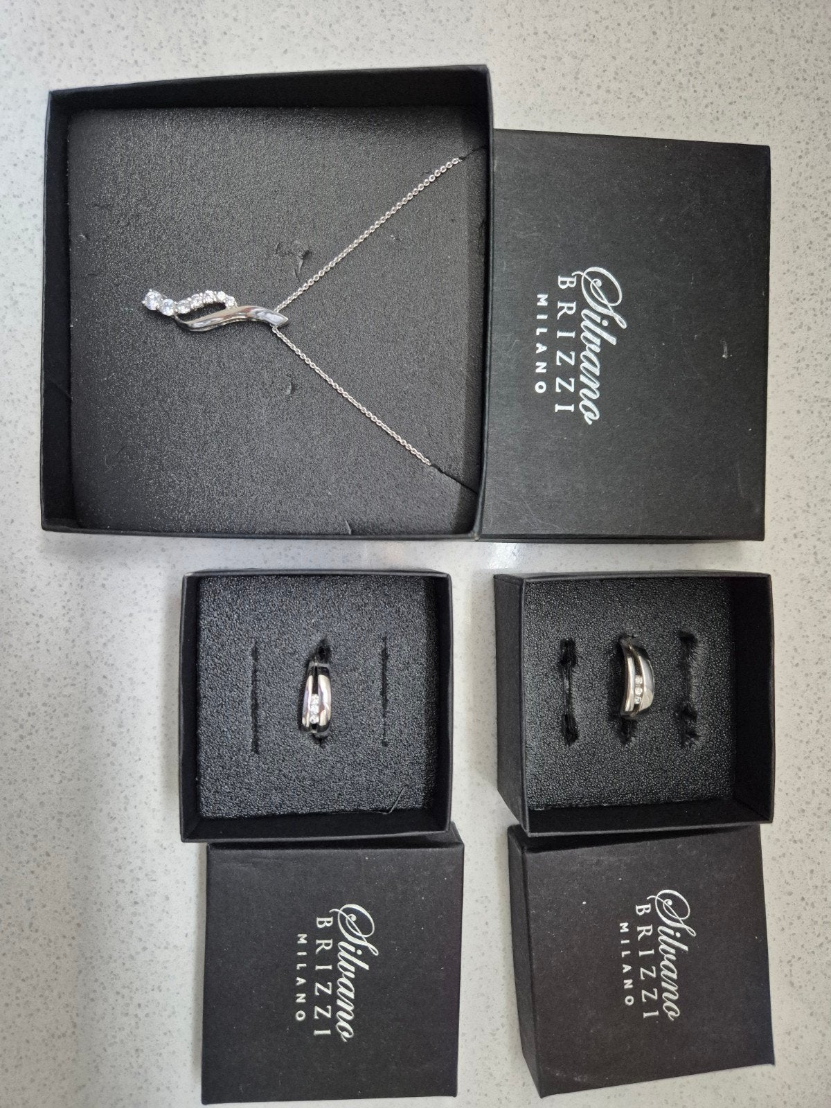 Silvano Brizzi Milano Set - Ketting en ring(en) & R, Met kristal, Ophalen of Verzenden, Zo goed als nieuw, Dame of Heer