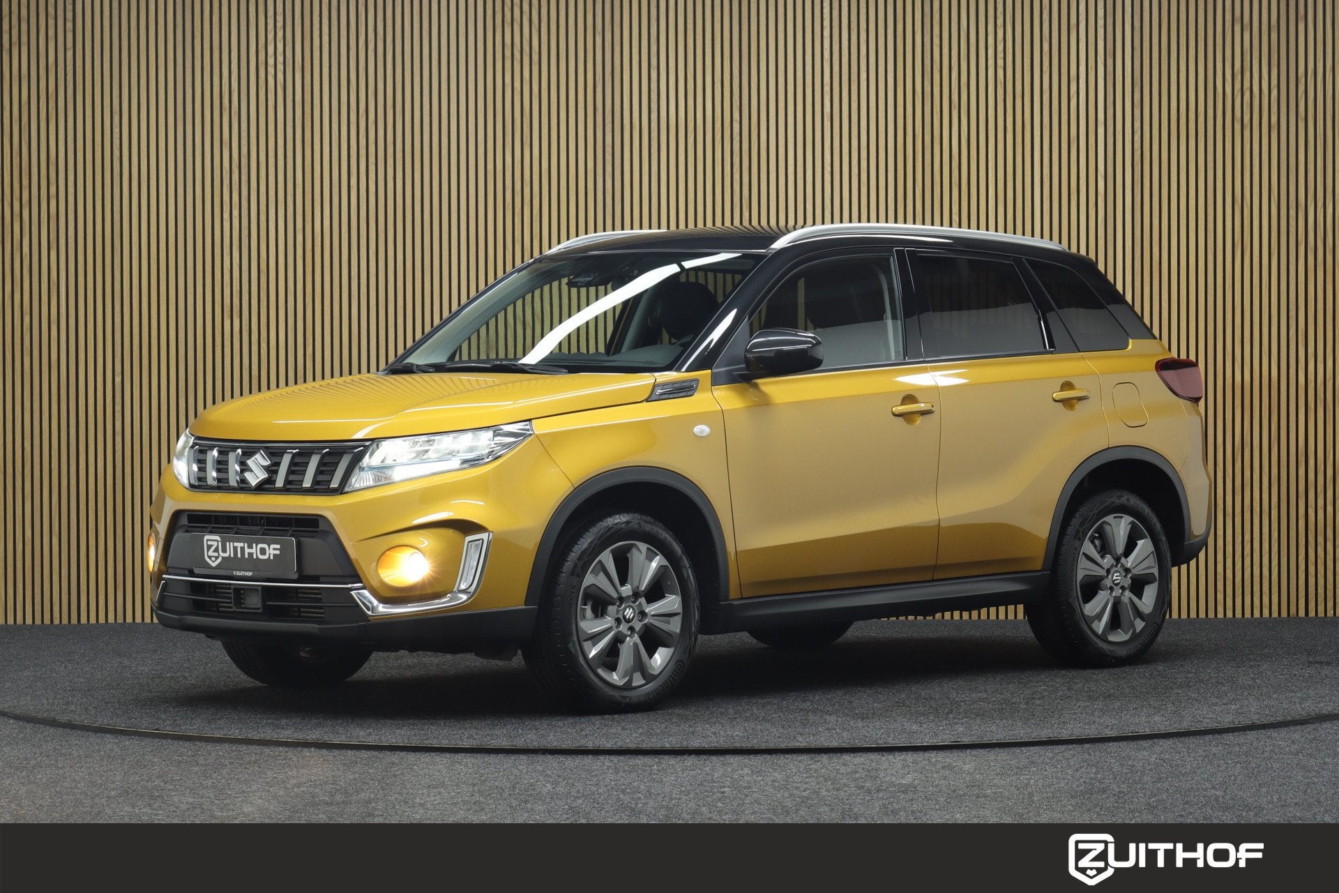 Suzuki Vitara 1.4 Boosterjet Select Rhino Edition Smart Hybr, Stof, Gebruikt, 4 cilinders, Geel