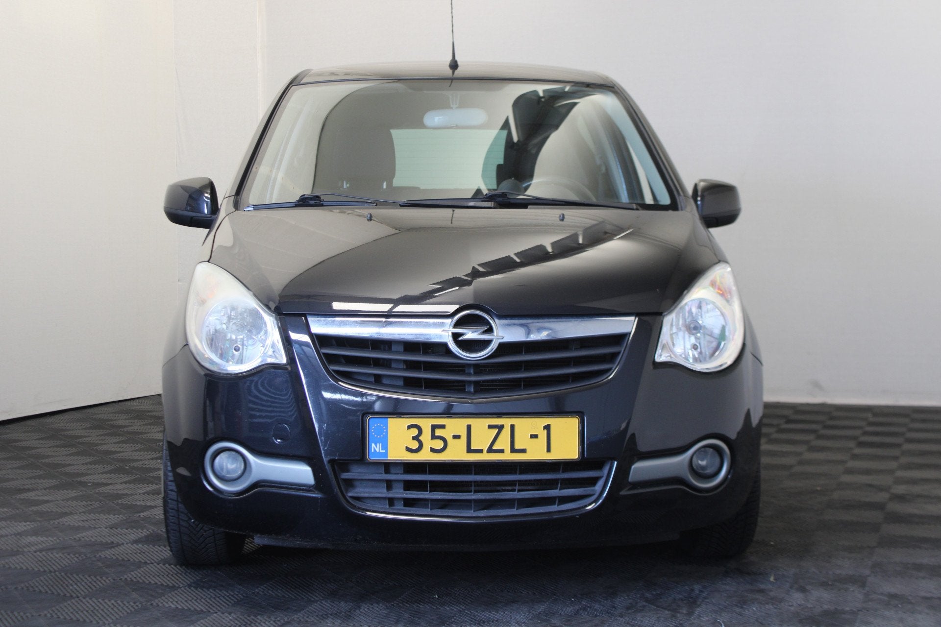 Opel Agila 1.2 Edition (bj 2010), Auto's, Voorwielaandrijving, 4 cilinders, 965 kg, Zwart