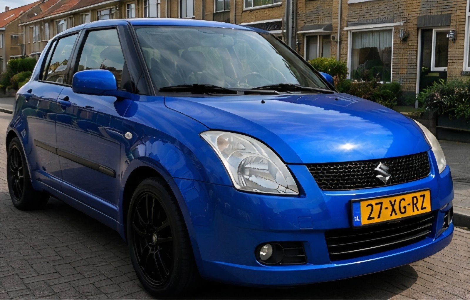 Suzuki Swift 1.3 5DRS 2007 Blauw / 179.013km, Voorwielaandrijving, Stof, 40 €/maand, Zwart