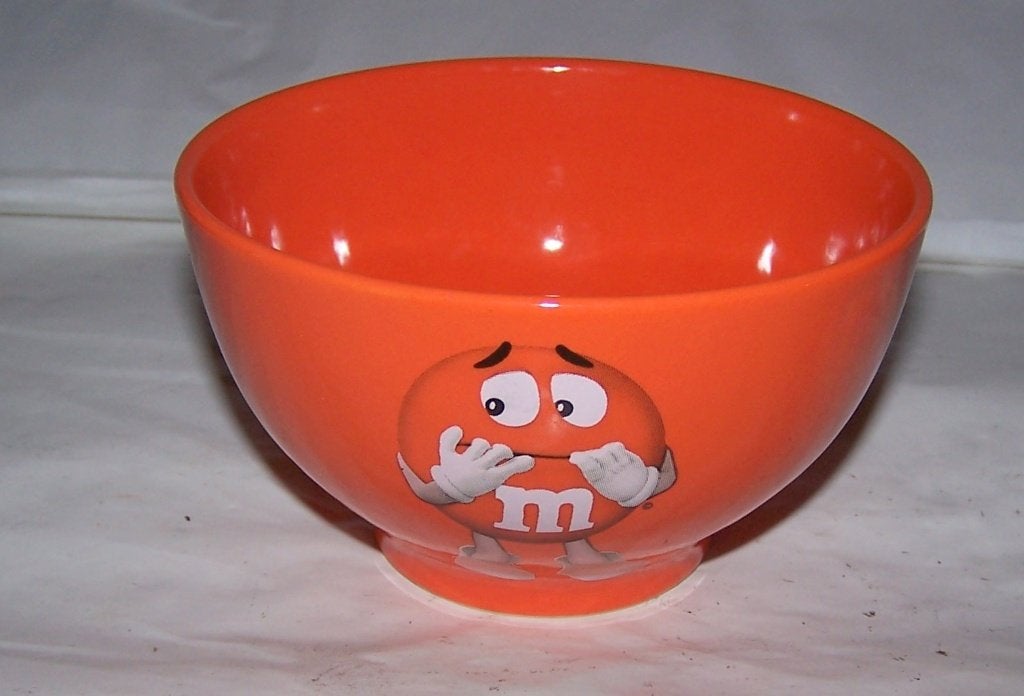 M&M mok Orange. Nieuwstaat., Overige merken, Keramiek, Ophalen of Verzenden, Zo goed als nieuw