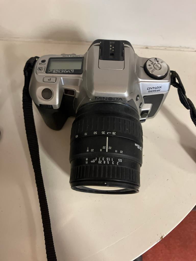 Minolta Dynax 505si Spiegelreflexcamera met Sigma Zoomlens, Audio, Tv en Foto, Fotocamera's Analoog, Ophalen of Verzenden, Zo goed als nieuw