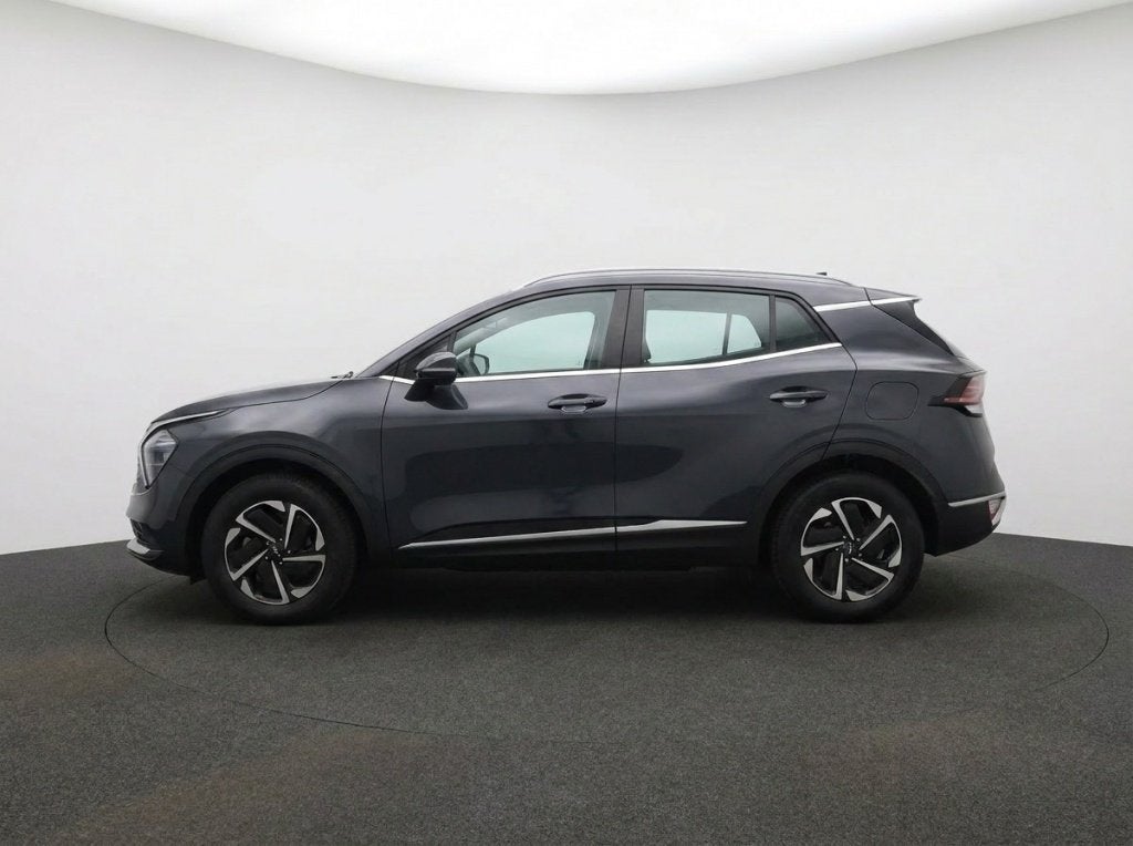 Kia Sportage 1.6 T-GDi Hybrid 230PK DynamicLine | Carplay |, Auto's, Stof, Gebruikt, 4 cilinders, Zwart